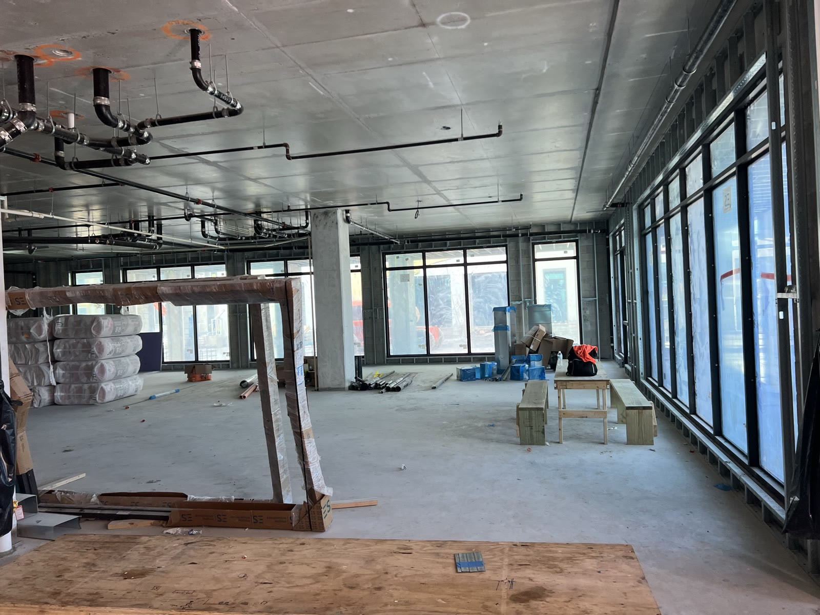 Commercial shell space with a window wall during a build-out